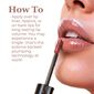 Applying Hot Kiss Brown Sugar Lip Plumper to lips for long-lasting volume, shine, and a fuller-looking pout. image number null